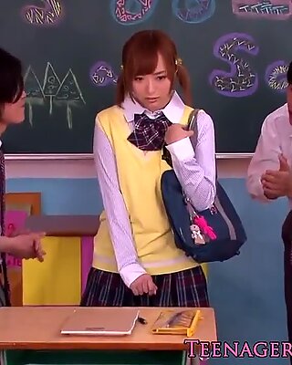 Japanese schoolgirl jerking in classroom gang