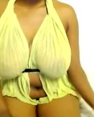 Ebony girl with massive breasts teases audience on webcam